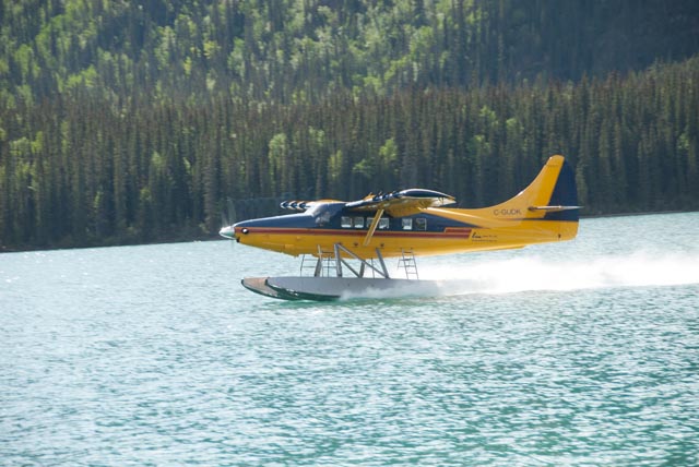 Floatplane taking off from campground lodge
