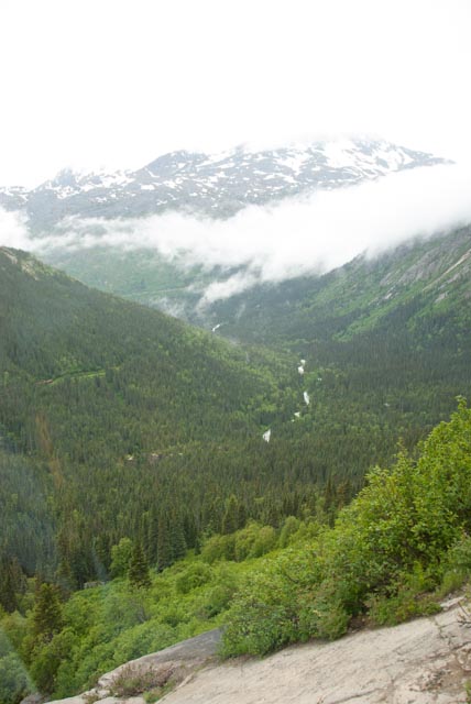View behind us, including clouds hanging between the mountains