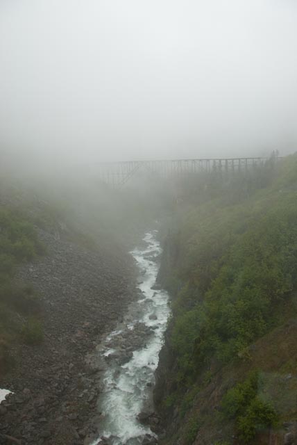 Abandoned railroad bridge emerges eerily out of the fog