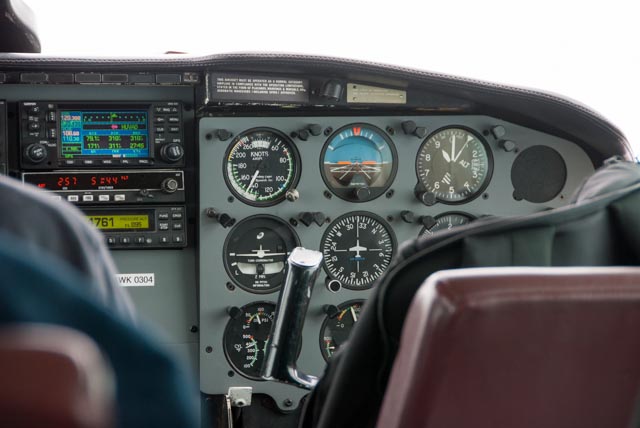 We flew at 9000 feet, just above the clouds that obscured our view of the earth
