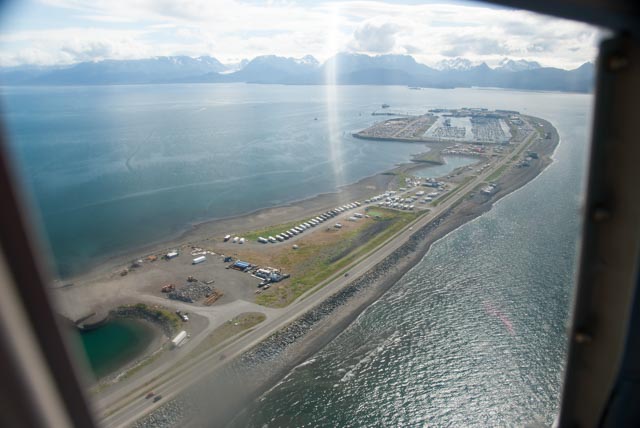 Our view of the Homer Spit shortly after our helicopter left the airport in Homer. Twenty-two of the motorhomes arranged neatly with windshields toward Kachemak Bay on the east side of the Spit are in our group.