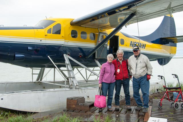 Dave, Marilyn, and our friend, Tom, pose near the de Havilland Otter that brought us on today's adventure. The plane carries serial number 52 and was built in 1954! The board walks under our feet rest on muskeg, which is a layer of living and dead organic matter floating on the lake.